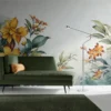 A modern, minimalist room features a green chaise lounge with a small orange pillow against a wall adorned with the Golden Petals Elegance Mural (Copy). A sleek floor lamp stands beside the chaise, and the room has a green carpet on a white floor.